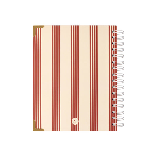 Alexa Lily 2026 weekly planner with red and beige vertical stripes and gold corner protectors