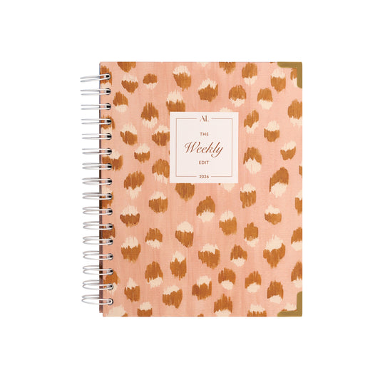 Alexa Lily 2026 weekly planner with pink and brown leopard print cover and spiral binding