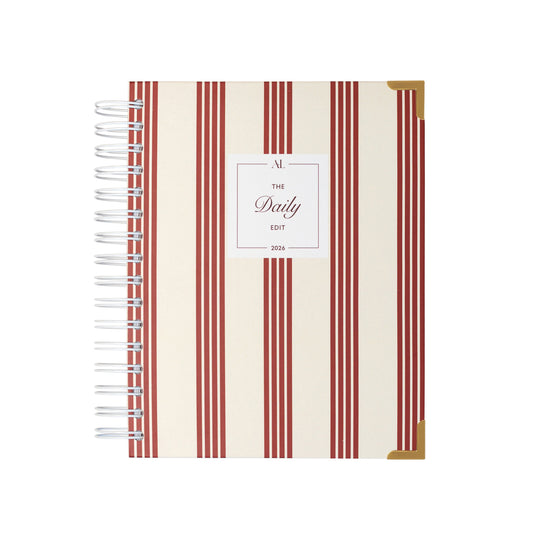 Alexa Lily 2026 daily planner with red and white vertical stripes and gold corner protectors